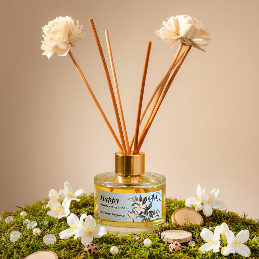 a reed diffuser surrounded by fresh jasmine flowers